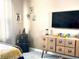 Harry Potter themed bedroom with dresser and TV at 2178 Cooper Bell Pl, Kissimmee, FL 34747