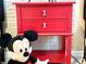 Red nightstand with Mickey Mouse drawer pulls at 2178 Cooper Bell Pl, Kissimmee, FL 34747