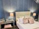 Bedroom with full bed and elegant decor at 2178 Cooper Bell Pl, Kissimmee, FL 34747