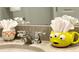 Fun bathroom with unique towel holders and fixtures at 2178 Cooper Bell Pl, Kissimmee, FL 34747
