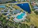 Aerial view of community pool, playground, and tennis courts at 17843 Golden Leaf Ln, Orlando, FL 32820