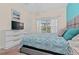 Spacious bedroom with a king-size bed and large windows at 8984 Stinger Dr, Champions Gate, FL 33896