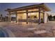 Outdoor pool bar with seating and a brick patio at 8984 Stinger Dr, Champions Gate, FL 33896