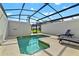 Private screened pool with plenty of space for lounging at 8984 Stinger Dr, Champions Gate, FL 33896