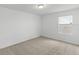 Simple bedroom with carpet and one window at 1128 Griffon Ave, Lake Alfred, FL 33850