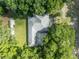 Aerial view showing house, detached shed, and large backyard at 191 E Ponkan Rd, Apopka, FL 32712