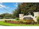 Venetian Bay Villages community entrance sign with lush landscaping at 2211 San Vittorino Cir # 105, Kissimmee, FL 34741