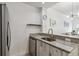 Modern kitchen with granite countertops and stainless steel appliances at 2211 San Vittorino Cir # 105, Kissimmee, FL 34741