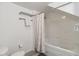 Bathroom with tub, shower, and updated fixtures at 2211 San Vittorino Cir # 105, Kissimmee, FL 34741