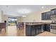 Kitchen with granite countertops and stainless steel appliances at 8940 Azalea Sands Ln # 8940, Davenport, FL 33896