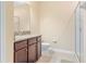 Small bathroom with shower and granite vanity at 8940 Azalea Sands Ln # 8940, Davenport, FL 33896