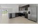 Modern kitchen with stainless steel appliances and granite counters at 2609 Bright Jewel St # 2909, Kissimmee, FL 34746