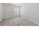 Simple bedroom with carpet and a window at 2609 Bright Jewel St # 2909, Kissimmee, FL 34746
