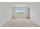 Spacious bedroom with carpeted floors and lake views at 2609 Bright Jewel St # 2909, Kissimmee, FL 34746