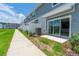 Private back patio with sliding glass doors at 2609 Bright Jewel St # 2909, Kissimmee, FL 34746
