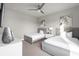 Bedroom with two twin beds and large window at 7770 Sandy Ridge Dr # 227, Reunion, FL 34747