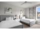 Bedroom with two twin beds and ceiling fan at 7770 Sandy Ridge Dr # 227, Reunion, FL 34747