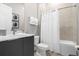 Bathroom with shower/tub combo and white vanity at 7770 Sandy Ridge Dr # 227, Reunion, FL 34747