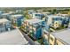Aerial view of modern townhouses with pool at 7770 Sandy Ridge Dr # 227, Reunion, FL 34747