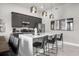 Modern kitchen with stainless steel appliances and island at 7770 Sandy Ridge Dr # 227, Reunion, FL 34747