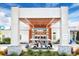 Community clubhouse with covered entrance and golf cart at 7770 Sandy Ridge Dr # 227, Reunion, FL 34747