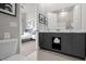 Modern bathroom with double vanity and large mirror at 7770 Sandy Ridge Dr # 227, Reunion, FL 34747