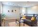 Bright and airy loft with comfortable seating and hardwood floors at 30053 Island Club Dr, Tavares, FL 32778