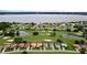 Birds-eye view of lakefront community near golf course at 30053 Island Club Dr, Tavares, FL 32778