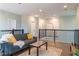 Relaxing loft with a gray couch and hardwood floors at 30053 Island Club Dr, Tavares, FL 32778