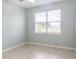 Well-lit bedroom with large window and ceiling fan at 30053 Island Club Dr, Tavares, FL 32778