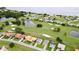 Community overview, showcasing lakefront homes and a golf course at 30053 Island Club Dr, Tavares, FL 32778