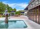 Relaxing poolside patio with fountain and seating at 530 E Central Blvd # 802, Orlando, FL 32801