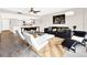 Open-concept living area with kitchen access, contemporary furniture, and stylish decor at 530 E Central Blvd # 802, Orlando, FL 32801