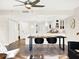 Modern kitchen features island, breakfast bar, and sleek white cabinetry at 530 E Central Blvd # 802, Orlando, FL 32801