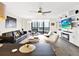 Spacious living room with modern furniture and city views at 530 E Central Blvd # 802, Orlando, FL 32801