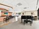 Clubhouse with a bar, piano, and ample seating for residents at 530 E Central Blvd # 802, Orlando, FL 32801