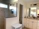 Bathroom with walk-in shower, double vanity, and tiled floors at 4739 Spring Grove Ln, Leesburg, Fl, FL 34748