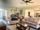 Living room with hardwood floors and comfortable seating at 4739 Spring Grove Ln, Leesburg, Fl, FL 34748