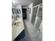 Spa-like bathroom with double vanity, large shower and walk-in closet at 5300 S Atlantic Ave # 8-207, New Smyrna Beach, FL 32169