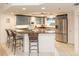 Modern kitchen with granite countertops and stainless steel appliances at 5300 S Atlantic Ave # 8-207, New Smyrna Beach, FL 32169
