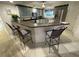 Modern kitchen with gray cabinets and granite countertops at 5300 S Atlantic Ave # 8-207, New Smyrna Beach, FL 32169