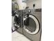 Laundry room with a washer and dryer at 5300 S Atlantic Ave # 8-207, New Smyrna Beach, FL 32169