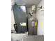 Utility room with air conditioning unit and water heater at 5300 S Atlantic Ave # 8-207, New Smyrna Beach, FL 32169