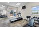 Fitness center featuring a treadmill and weight bench at 5300 S Atlantic Ave # 8-207, New Smyrna Beach, FL 32169