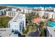 Aerial view of oceanfront condo complex with pool and tennis courts at 5300 S Atlantic Ave # 8-207, New Smyrna Beach, FL 32169