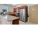 Well-equipped community kitchen with stainless steel appliances at 5300 S Atlantic Ave # 8-207, New Smyrna Beach, FL 32169
