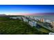 Aerial view of beachfront property with ocean and building views at 5300 S Atlantic Ave # 8-207, New Smyrna Beach, FL 32169