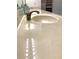 Double vanity with beige countertop and brushed nickel faucets at 5300 S Atlantic Ave # 8-207, New Smyrna Beach, FL 32169