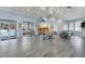 Community room with seating, kitchenette, and pool view at 5300 S Atlantic Ave # 8-207, New Smyrna Beach, FL 32169