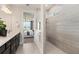 Spa-like bathroom with walk-in shower and modern vanity at 1967 Spring Shower Cir, Kissimmee, FL 34744